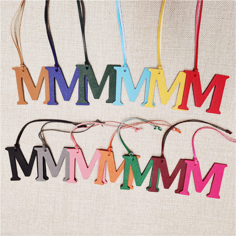 XMESSUN New English Letters M  - Monogram Keychain Leather recension och pris